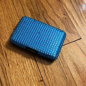 Dazzle hard shell turquoise snap wallet